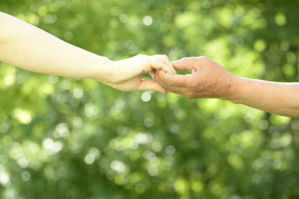 istock Image of care with hand close-up 1159170912