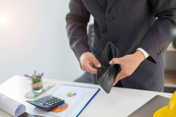 istock Businessman pulled out of his inside jacket pocket wallet 1159170952