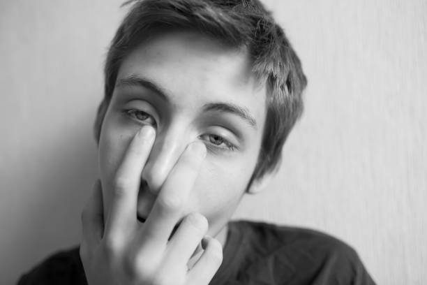 istock Teen boy looking away 1159171668