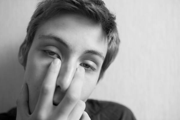 istock Teen boy looking away 1159171704