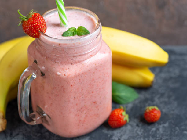 istock Close-up of strawberry milk smoothie 1159171969
