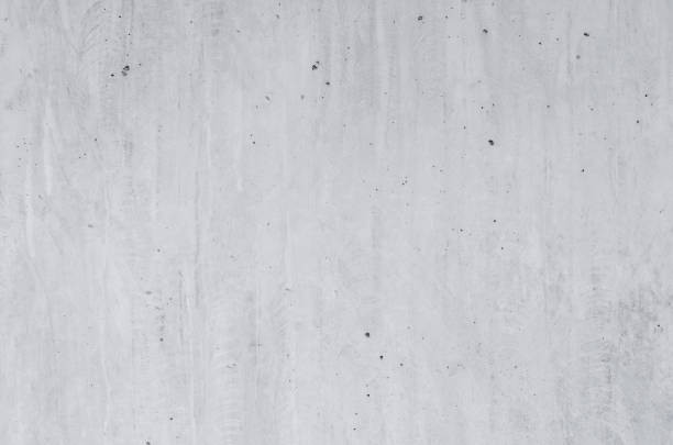 istock gray concrete background texture clean stucco fine grain cement wall clear and smooth white polished grunge interior indoor. 1159172948