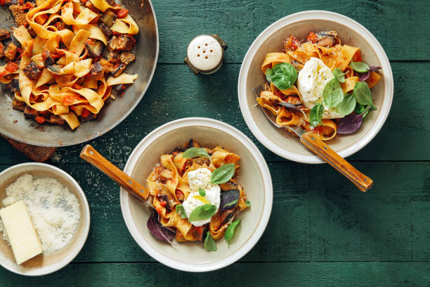 istock Pappardelle with eggplant, creamy tomato sauce and mozzarella 1159173121
