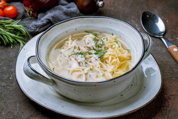 istock Chicken soup bouillon in a plate 1159174102
