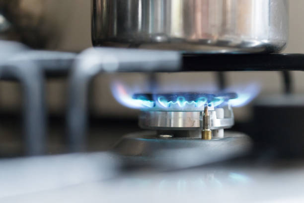 istock Cooking with gas, water pot in kitchen 1159174195