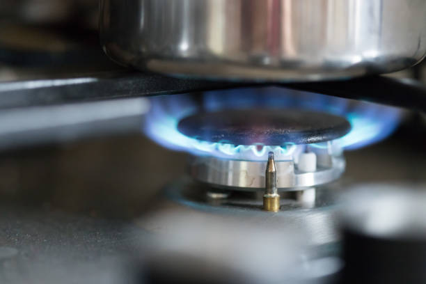 istock Cooking with gas, water pot in kitchen 1159174270
