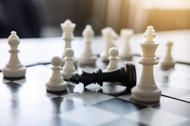 istock Chess leadership and success concept, chess save the strategy and king on chess board 1159177860