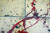 Tiles with red paint splatters
