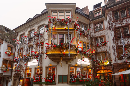 Traditional Alsatian half-timbered house in old town of Strasbourg, decorated at christmas time, Alsace, France