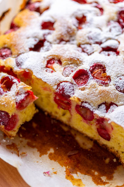 istock Home made cherry cake with powdered sugar 1159183529