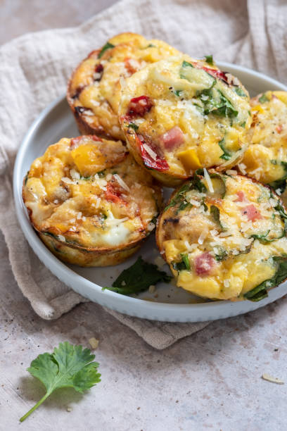 istock Egg muffins with ham, cheese and vegetables 1159186147
