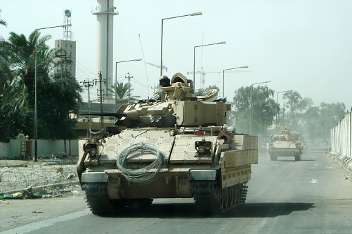 Iraq, Baghdad - 4 July 2016 Military army vehicle tank on tracks with barrel