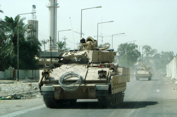 iraq Iraq, Baghdad - 4 July 2016 Military army vehicle tank on tracks with barrel ironclad stock pictures, royalty-free photos & images