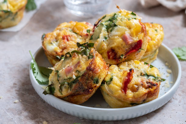 istock Egg muffins with ham, cheese and vegetables 1159186235