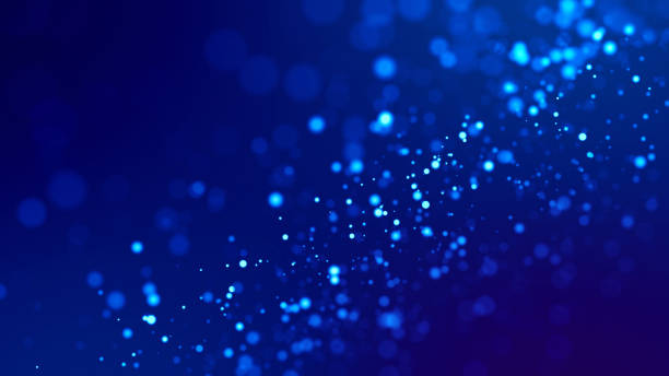istock glow blue particles on blue background are hanging in air for bright festive presentation with depth of field and light bokeh effects. Version 2 1159187742
