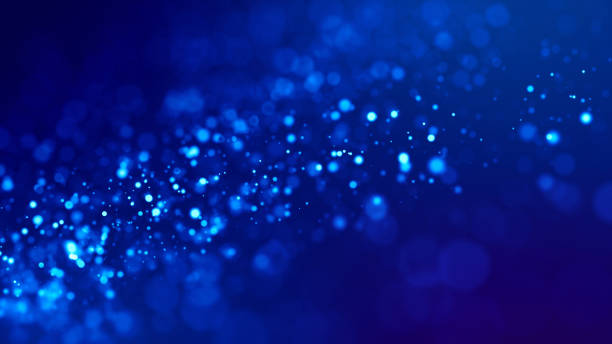 istock glow blue particles on blue background are hanging in air for bright festive presentation with depth of field and light bokeh effects. Version 17 1159187898