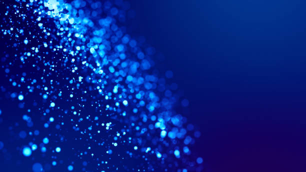 istock Microcosm. Glow blue particles on blue background are hanging in air for bright festive presentation with depth of field and light bokeh effects. Version 8 1159188040