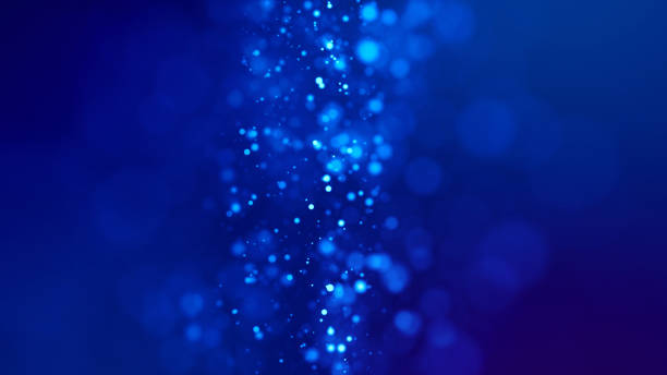 istock Microcosm. Glow blue particles on blue background are hanging in air for bright festive presentation with depth of field and light bokeh effects. Version 18 1159188647