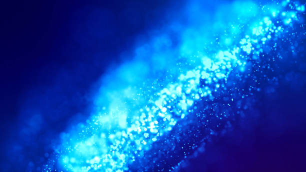 istock Microcosm. Glow blue particles on blue background are hanging in air for bright festive presentation with depth of field and light bokeh effects. Version 19 1159188651