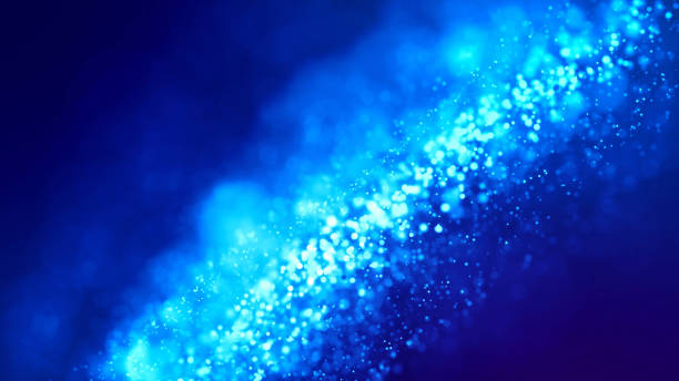 istock Microcosm. Glow blue particles on blue background are hanging in air for bright festive presentation with depth of field and light bokeh effects. Version 21 1159188657