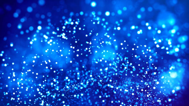 istock Science fiction. Glow blue particles on blue background are hanging in air for bright festive presentation with depth of field and light bokeh effects. Version 28 1159189168