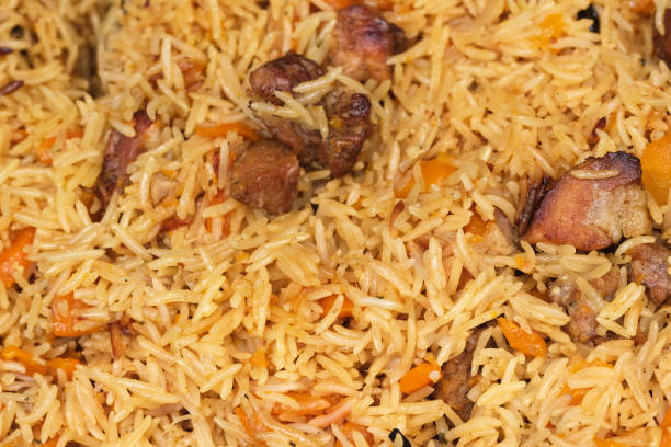 istock Food background of pilaf with rice 1159190093