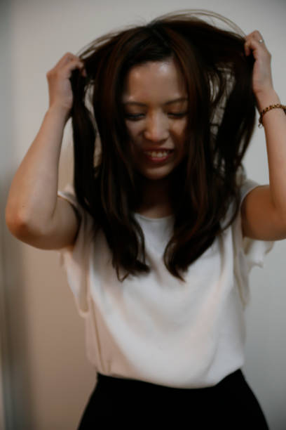 istock woman with a cute smile 1159190449