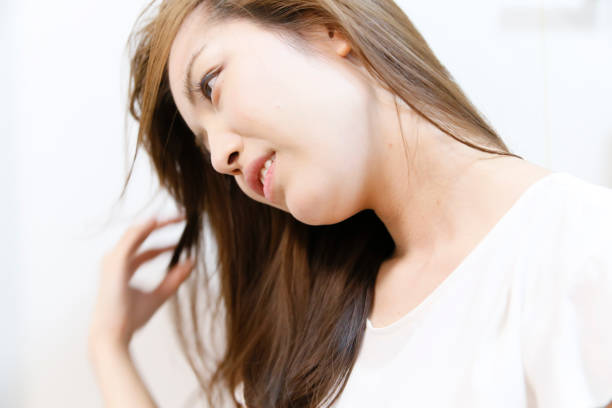 istock woman with a cute smile 1159190494