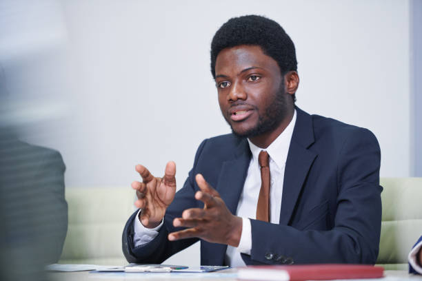 istock Confident African businessman explaining working moments 1159190651