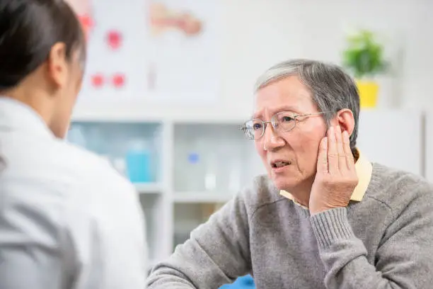 elder patient see an ent doctor and complain about earaches