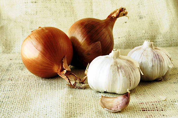istock onion with garlic on jute 115919650