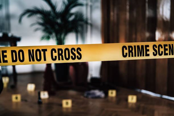 istock Forensic Science. Police Investigator Collecting Clues 1159196601