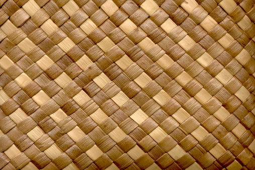 Palm leaves woven in diagonal pattern. Made in Hawaii.