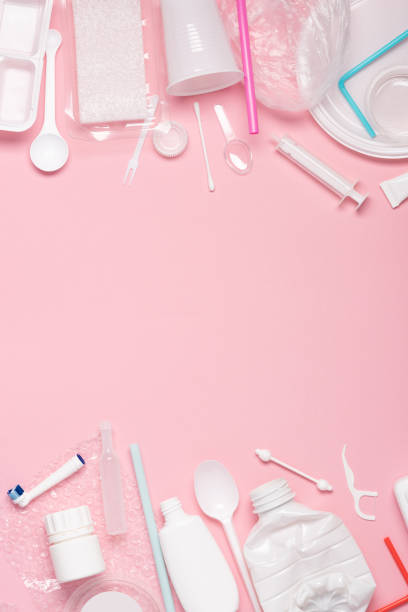 istock Eco plastic recycling concept. Single use plastics on pink pastel background 1159198672