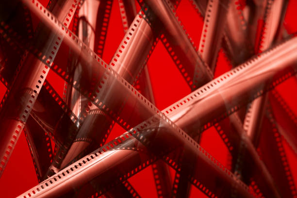 Analog film tape. Selective focus. Red color theme