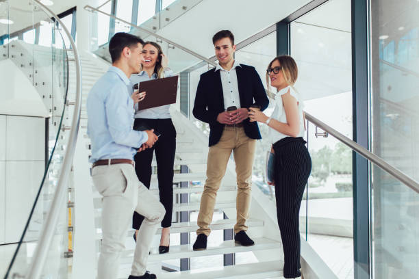 istock Group of businesspeople using a digital tablet together in office building 1159200386