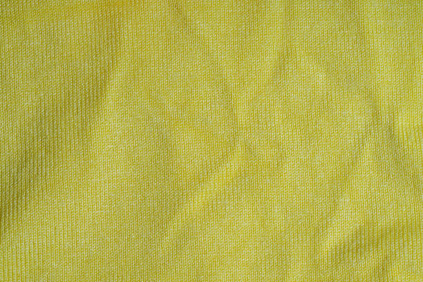 istock Knitted fabric structure Yellow green color. Creative vintage background. 1159201277