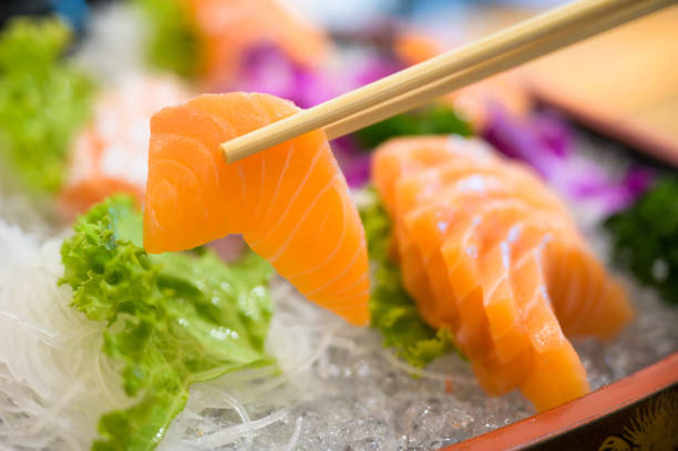 istock Japanese food style salmon sashimi, raw sliced fish 1159201467