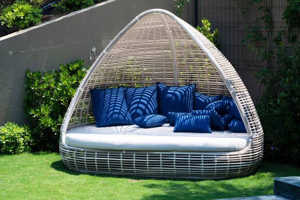 The  many cushion comfortable sofa in balcony modern apartment  as looking  green garden