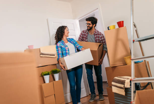 istock Happy young couple moving into their new home. 1159202905