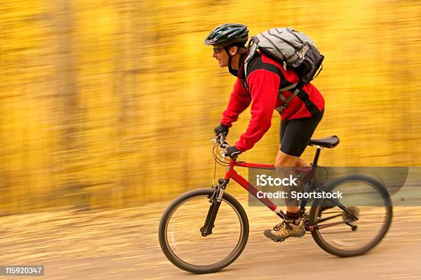 Mountain Biker In Blurred Background Stock Photo - Download Image Now - Mountain Biking, Black Color, Colorado