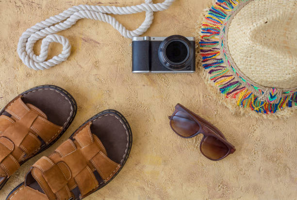 istock Summer lifestyle concept with hat, smartphone and camera. 1159205623