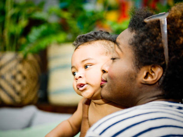 istock African mother with mixed race son 1159206555
