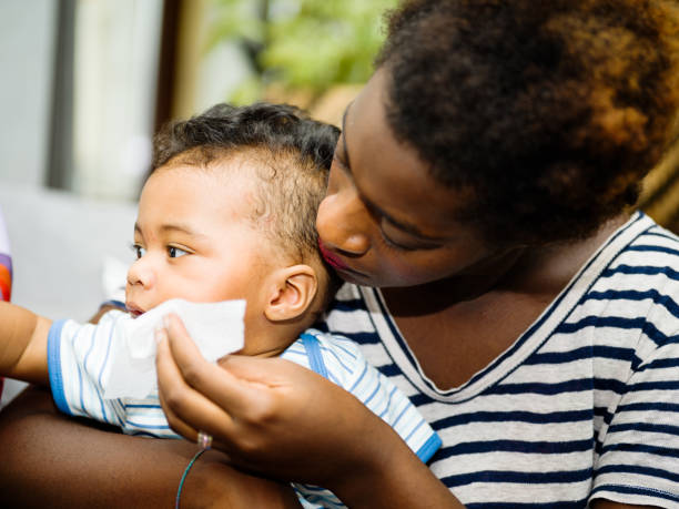 istock African mother with mixed race son 1159206657