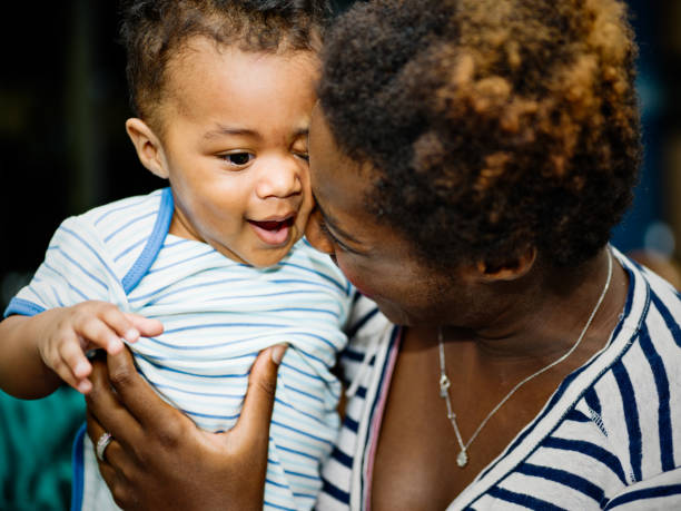 istock African mother with mixed race son 1159206733