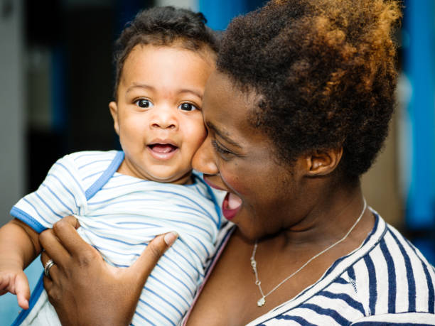 istock African mother with mixed race son 1159206785