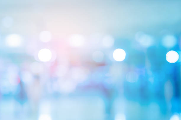 istock abstract blur motion beautiful blue colorful with luxury bokeh bulbs and orange light effect background in gala event  for design as banner template concept 1159207052