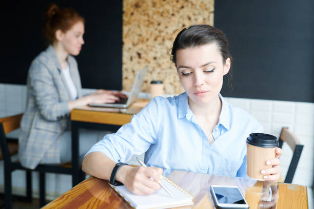 istock Creative woman working on marketing project 1159211281