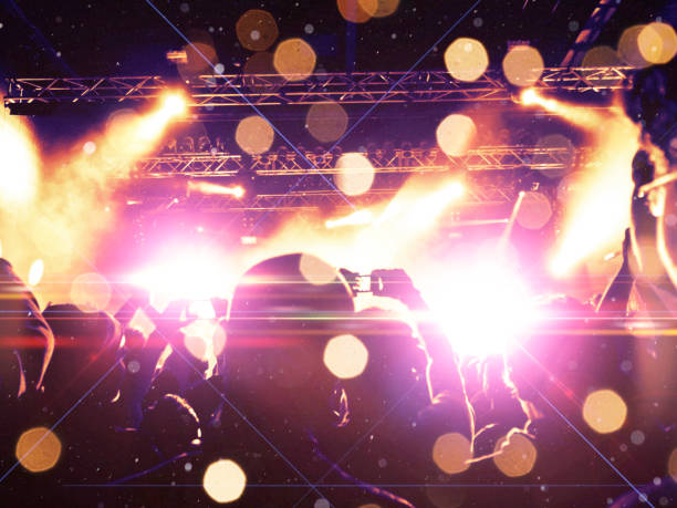 istock Filming concert on smart phone 1159211486