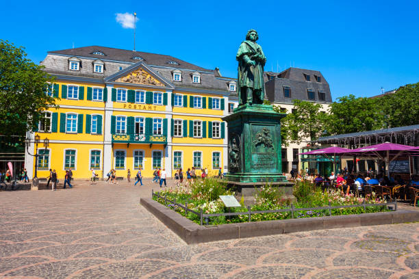Beethoven monument in Bonn, Germany BONN, GERMANY - JUNE 29, 2018: Ludwig van Beethoven monument and post office in the centre of Bonn city in Germany ludwig van beethoven photos stock pictures, royalty-free photos & images